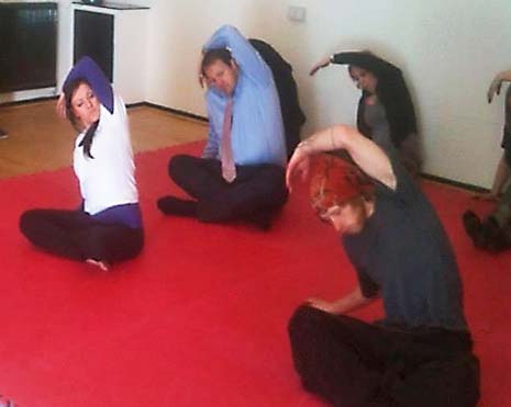 Chesterfield MP Toby Perkins (second left), stretches out during a Yoga lesson