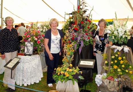 Guild arrangers with their colourful display. (l-r) Mrs Celia Kelly, Mrs Joan Marrison and Mrs Anne Eyley.