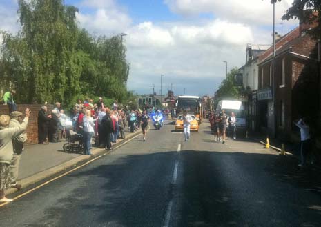 Crowds are still lining the streets to cheer the torch on as it heads along Chatsworth Road