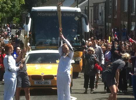 And the 3rd Olympic Torch Bearer takes their turn...