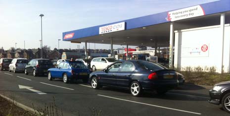 Queues build up around Chesterfield's petrol stations after government advice causes 'panic buying' across the UK