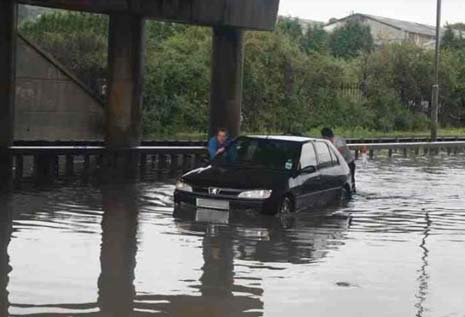 Some cars were caught out as the flood water levels rise