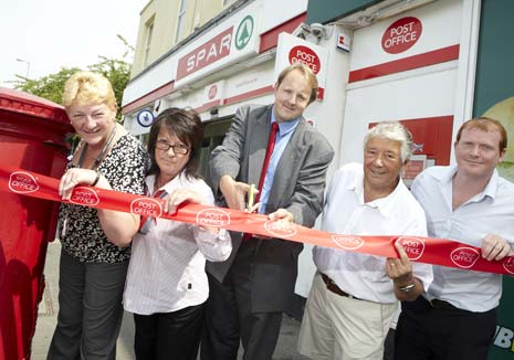 To celebrate the launch of the new-look Whittington Moor Post Office, Chesterfield MP Toby Perkins cut the ribbon at an official opening ceremony at the branch with Subpostmaster Tim Holmes today, 12th July, 2013.