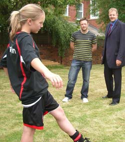 Megan Tinsley with her dad Lyndon and Toby Perkins MP.