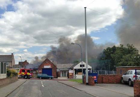 The fire scene soon after it had occured from the Swim School side of Stone Lane