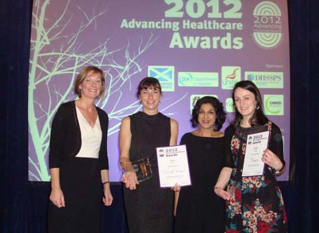 Therapists in the frame – award winners Andrea Robinson (second left) and Ruth Young (far right), are congratulated by Karen Middleton, Chief Health Professions Officer at the Department of Health (far left) and Kamini Gadhok, MBE, Chief Executive Officer for the Royal College of Speech and Language Therapists (second right) after being announced as winners of the 2012 Advancing Healthcare Award. 