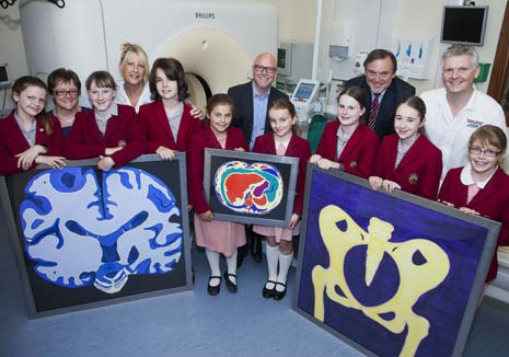 Ashdell School students with their works of art for the CT dept at Chesterfield Royal, with their teacher, dept staff and the Royal's CEO Gavin Boyle (centre)