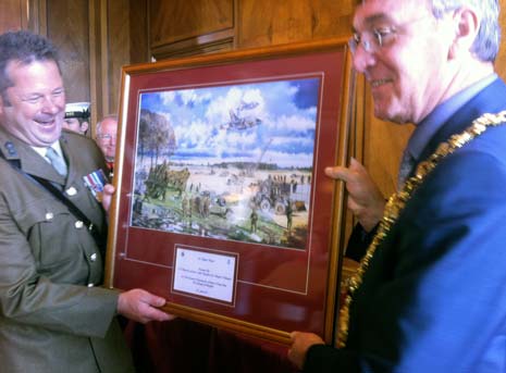 The Unit's Commanding Officer Major Callingham presented a gift to the Borough.