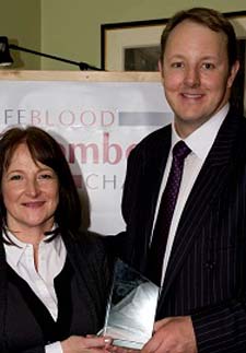 Chesterfield Royal Principle Pharmacist, Anna Braithwaite, receives her award from Toby Perkins, MP for Chesterfield