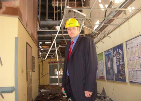 Chesterfield MP Toby Perkins tours the devestated main entrance at Chesterfield Royal Hospital after the weekends fire