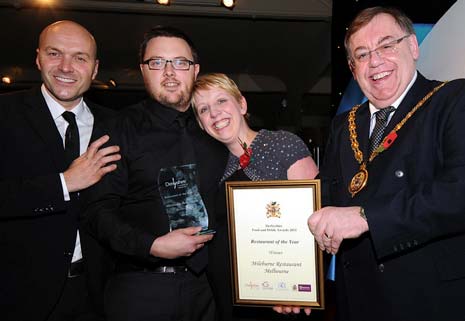 Winners of Derbyshire Restaurant of the Year - Mileburne - Simon Rimmer and Chairman of the Council Councillor George Wharmby with winners, owners  Andrew and Rebecca Dann