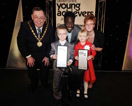 brother and sister winners Bradley - James and Millie with their mum Rebecca , Chairman of the Council George Wharmby and Blue Peter Presenter Andy Akinwolere 