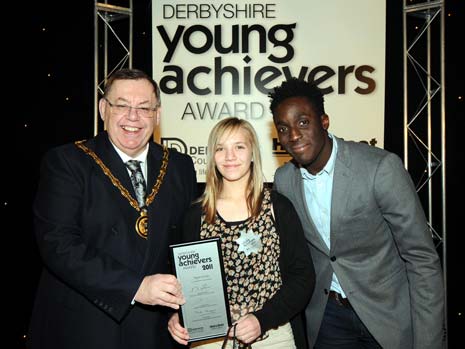 Winner Megan Tinsley with Cllr George Wharmby and Andy Akinwolere