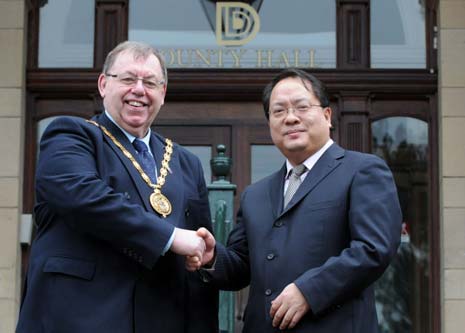 Derbyshire County Council Chairman Councillor George Wharmby welcomes Pan Yundong, Consul General of China, to County Hall, Matlock.