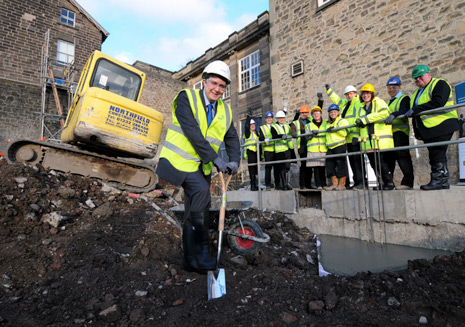 GOOD FOUNDATIONS: Councillor Andrew Lewer, Derbyshire County Council Leader and Cabinet Member for Culture, performs the ceremony before authority employees and construction staff.  