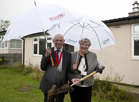 Cllr Betty Hill, Member with Responsibility for Housing, cut the first piece of turf alongside Chair of Killamarsh Parish Council, Cllr Barry Jones