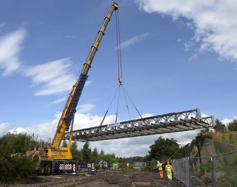 Closure allowed for the removal of the 'Bailey' bridge over Erin Road, and for groundwork to begin for gas, water and electricity supplies.