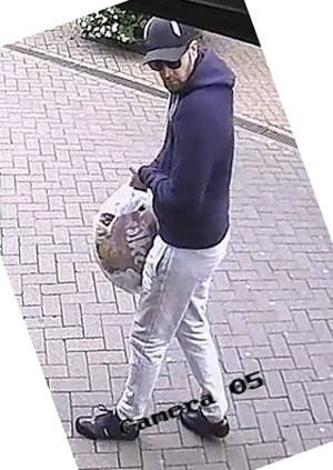 Officers investigating an attempted robbery at a building society in Chesterfield have issued a CCTV image of a man they are trying to trace.