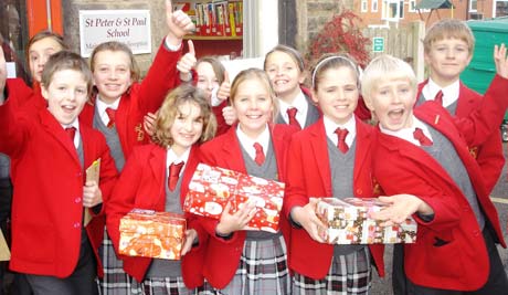 Pupils from St Peter and St Pauls school celebrate their schools achievement