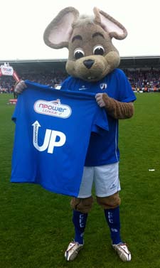 Chester' the Field Mouse celebrates the title in style yesterday.