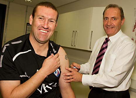 Spireites Coach Mark Crossley gets his 'shot in the arm' to protect him from Flu this winter