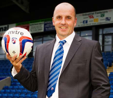 Chesterfield FC Manager Paul Cook has pledged his future to the club by signing a new contract.