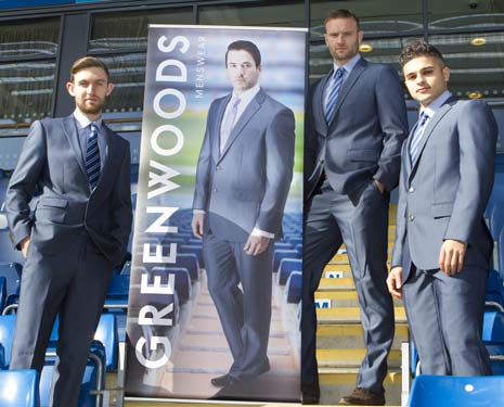 Chesterfield FC players and staff will make a stylish entrance at Wembley Stadium for the Johnstone's Paint Trophy final, after being supplied with smart new suits for the occasion by Greenwoods Menswear.