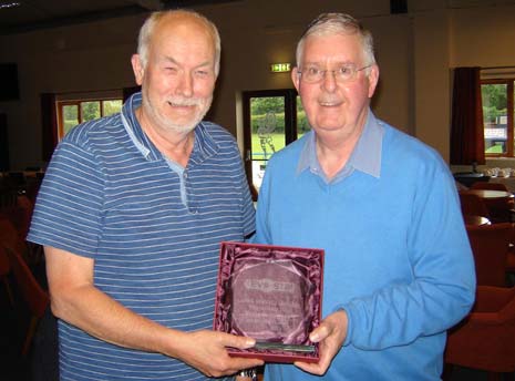 Matlock Chairman Tom Wright receives his award from League Vice Chairman and MTFC Club Secretary, Keith Brown