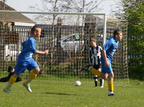 Jordan Wells (right) wheels away to celebrate after scoring Somersall's final goal of the season in a 3-0 win against Treeton Terriers