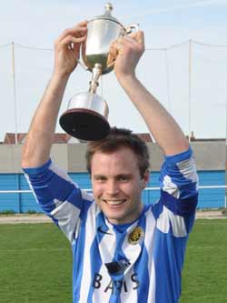 Staveley Captain Micheal Staley with the NCEL Division 1 Trophy