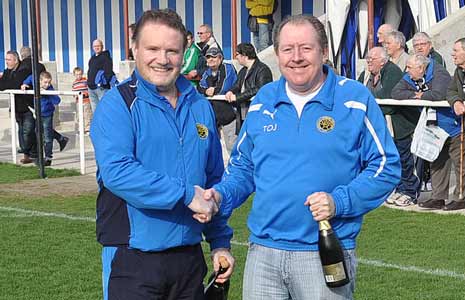 Chairman Terry Damms and Vice Chairman Tony Bruce celebrate the Championship coming to Staveley